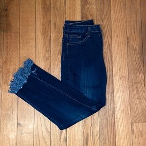 Denim jeans with little pulls at the ankle. From a local boutique. Size 30